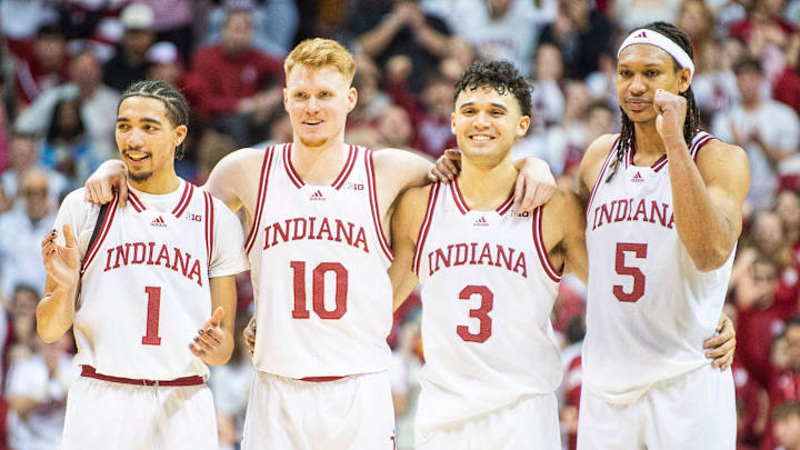 Indiana's Myles Rice (1), Luke Goode (10), Anthony Leal (3) and Malik Reneau (5) watch Trey Galloway (32) shoot a free throw during the Indiana versus Purdue mens basketball game at Simon Skjodt Assembly Hall on Sunday, Feb. 23, 2025.