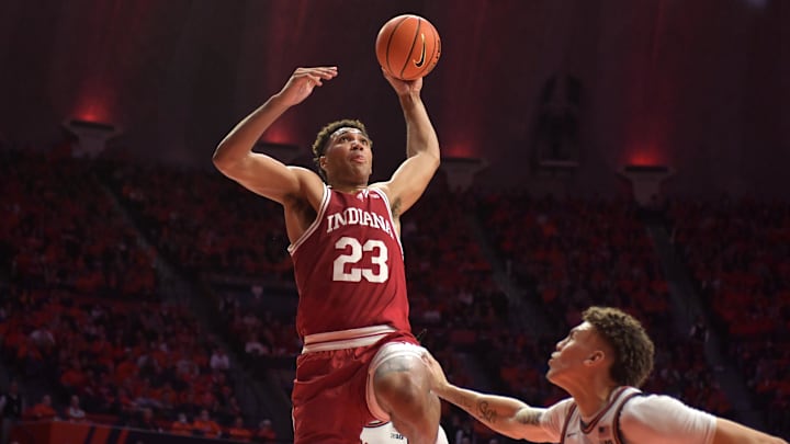 Indiana Hoosiers forward Trayce Jackson-Davis (23) goes to the basket over Illinois Fighting Illini forward Coleman Hawkins (33) during the second half at State Farm Center.