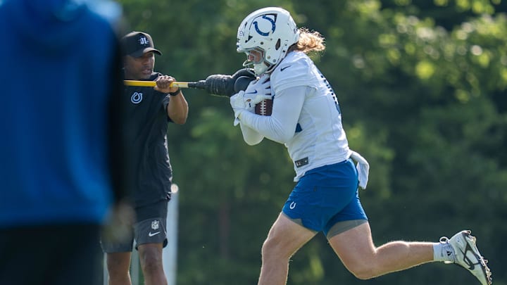 Indianapolis Colts tight end Tyler Warren (84) works through pass catching drills Thursday, July 24, 2025, during training camp held at Grand Park in Westfield. Indianapolis Colts tight end Tyler Warren (84) works through pass catching drills Thursday, July 24, 2025, during training camp held at Grand Park in Westfield.