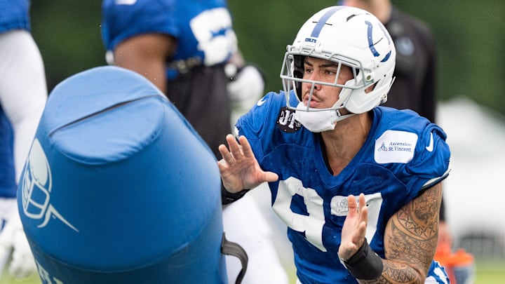 Indianapolis Colts defensive end Laiatu Latu (97) works through a drill Monday, July 28, 2025, during training camp held at Grand Park in Westfield. Indianapolis Colts defensive end Laiatu Latu (97) works through a drill Monday, July 28, 2025, during training camp held at Grand Park in Westfield.