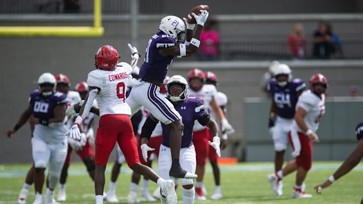 Stephen F. Austin Lumberjacks defensive back Charles Demmings (21) intercepts a pass as Jacksonville State Gamecocks take on Stephen F. Austin Lumberjacks during the FCS Kickoff at Cramton Bowl in Montgomery, Ala., on Saturday, Aug. 27, 2022. Stephen F. Austin Lumberjacks defensive back Charles Demmings (21) intercepts a pass as Jacksonville State Gamecocks take on Stephen F. Austin Lumberjacks during the FCS Kickoff at Cramton Bowl in Montgomery, Ala., on Saturday, Aug. 27, 2022.