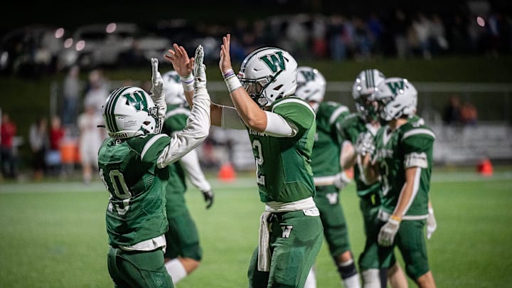 Wachusett RB Cole Carelli, left, and QB Tucker McDonald celebrate after Carelli scored their sixth touchdown of the night versus Fitchburg High School.

Fit Wachfb 091622 13