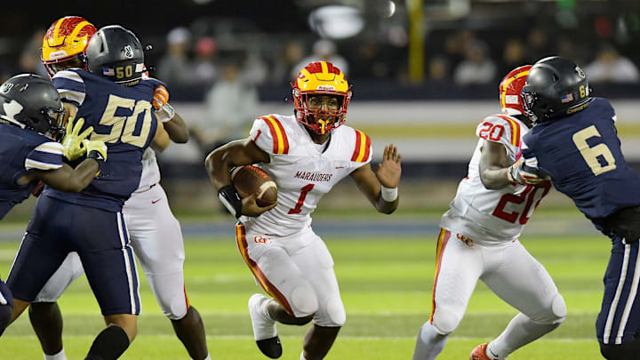 Clearwater Central Catholic's Quarterback Jershaun Newton (1) finds running room during early first quarter action. The Clearwater Central Catholic Marauders traveled to Jacksonville, FL to take on the University Christian Christians in the Florida High School Athletic Association Class 1M starts football semifinal match Friday, December 2, 2022. The Marauders came away with a 29 to 34 win over the Christians.

Jki 120222 Hsfb Clearwater Vs Univ Christian 09