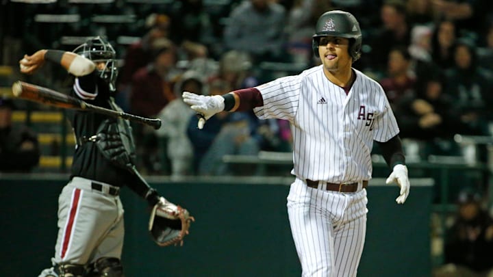 ASU second baseman Carter Aldrete walks to first during a baseball game against New Mexico at Phoenix Municipal Stadium on March 13, 2019. 

Asu Vs New Mexico