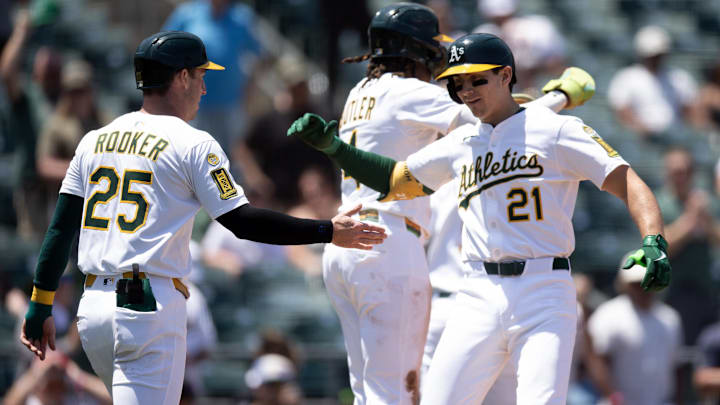 Jun 5, 2025; West Sacramento, California, USA; Athletics first baseman Tyler Soderstrom (21) is greeted by teammates after hitting a grand slam against the Minnesota Twins during the fourth inning at Sutter Health Park. Mandatory Credit: D. Ross Cameron-Imagn Images