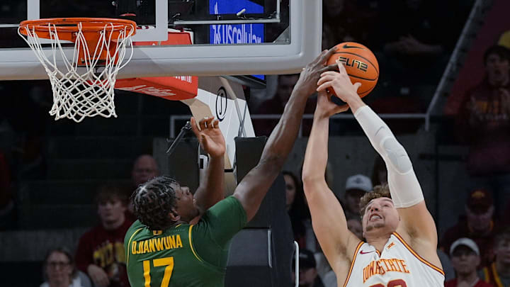 Iowa State Cyclones forward Brandton Chatfield (33) rebounds the ball around Baylor Bears forward Josh Ojianwuna (17) during the first half in the NCAA men’s basketball at Hilton Coliseum on Saturday, Jan. 4, 2025, in Ames, Iowa.