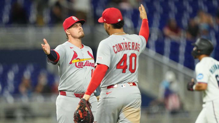 Aug 19, 2025; Miami, Florida, USA;  St. Louis Cardinals third baseman Nolan Gorman (16) celebrates a victory against the Miami Marlins with first baseman Willson Contreras (40) at loanDepot Park. Mandatory Credit: Jim Rassol-Imagn Images