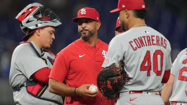 Aug 20, 2025; Miami, Florida, USA;  St. Louis Cardinals manager Oliver Marmol makes a pitching change in the seventh inning against the Miami Marlins at loanDepot Park. Mandatory Credit: Jim Rassol-Imagn Images