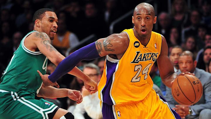 February 20, 2013; Los Angeles, CA, USA; Los Angeles Lakers shooting guard Kobe Bryant (24) moves to the basket against the Boston Celtics during the second half at Staples Center. Mandatory Credit: Gary A. Vasquez-Imagn Images