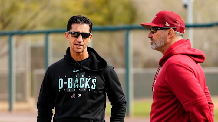 Arizona Diamondbacks general manager Mike Hazen talks to manager Torey Lovullo during spring training workouts at Salt River Fields in Scottsdale on Feb. 17, 2023. Arizona Diamondbacks general manager Mike Hazen talks to manager Torey Lovullo during spring training workouts at Salt River Fields in Scottsdale on Feb. 17, 2023.
