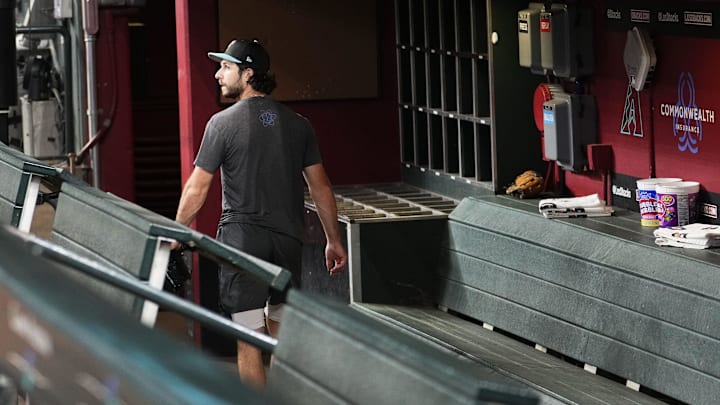 Arizona Diamondbacks pitcher Zac Gallen (23) looks at the centerfield screen as the Atlanta Braves beat the New York Mets in the second game of a doubleheader to end the Diamondbacks season at Chase Field in Phoenix on Sept. 30, 2024. Arizona Diamondbacks pitcher Zac Gallen (23) looks at the centerfield screen as the Atlanta Braves beat the New York Mets in the second game of a doubleheader to end the Diamondbacks season at Chase Field in Phoenix on Sept. 30, 2024.