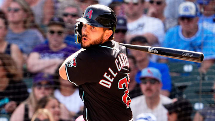 Arizona Diamondbacks' Adrian Del Castillo hits a double against the Kansas City Royals in the second inning during a spring training game at Salt River Fields at Talking Stick on Feb. 28, 2025, in Scottsdale.