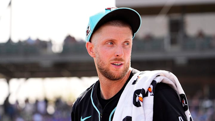 Arizona Diamondbacks pitcher Merrill Kelly returns to the clubhouse after throwing for two innings to the Kansas City Royals during a spring training game at Salt River Fields at Talking Stick on Feb. 28, 2025, in Scottsdale.