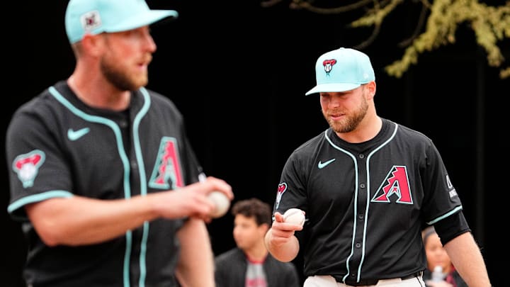 Arizona Diamondbacks new pitcher Corbin Burnes throws in the bullpen on the first day of spring training practice at Salt River Fields at Talking Stick in Scottsdale on Feb. 12, 2025.
