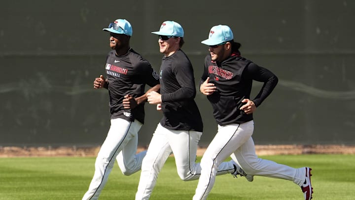 Arizona Diamondbacks Kristian Robinson, Jake McCarthy, and Eugenio Su‡rez (right) during spring training workouts at Salt River Fields at Talking Stick on Feb. 18, 2025, in Scottsdale.