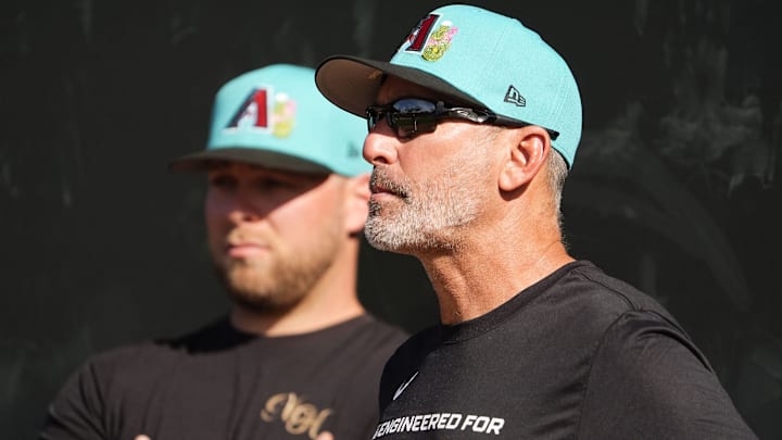 Arizona Diamondbacks manager Torey Lovullo and pitcher Corbin Burnes (left) during spring training workouts on Feb. 10, 2026, at Salt River Fields in Scottsdale.