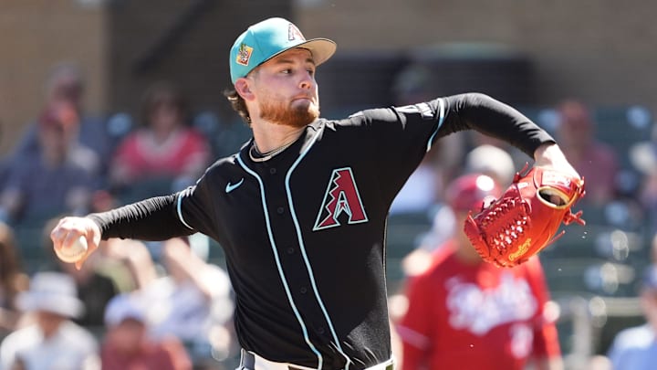 Arizona Diamondbacks pitcher Ryne Nelson (19) throws to the Cincinnati Reds in the second inning during a spring training game on March 16, 2026, at Salt River Fields in Scottsdale.