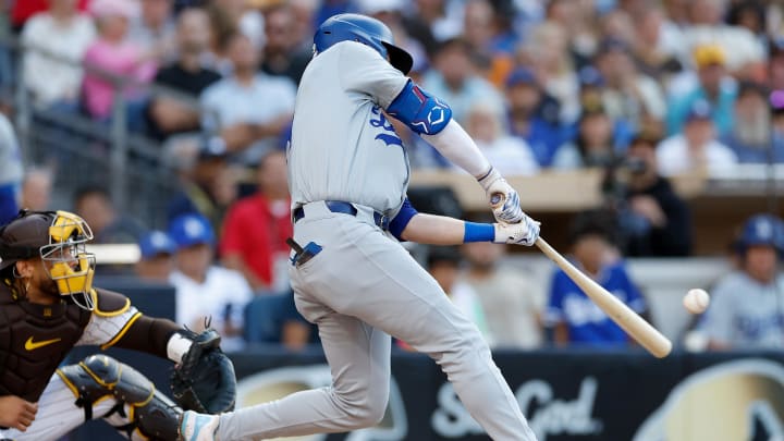 Jul 31, 2024; San Diego, California, USA; Los Angeles Dodgers second baseman Gavin Lux (9) hits a RBI double during the third inning against the San Diego Padres at Petco Park. Mandatory Credit: David Frerker-USA TODAY Sports Jul 31, 2024; San Diego, California, USA; Los Angeles Dodgers second baseman Gavin Lux (9) hits a RBI double during the third inning against the San Diego Padres at Petco Park. Mandatory Credit: David Frerker-USA TODAY Sports