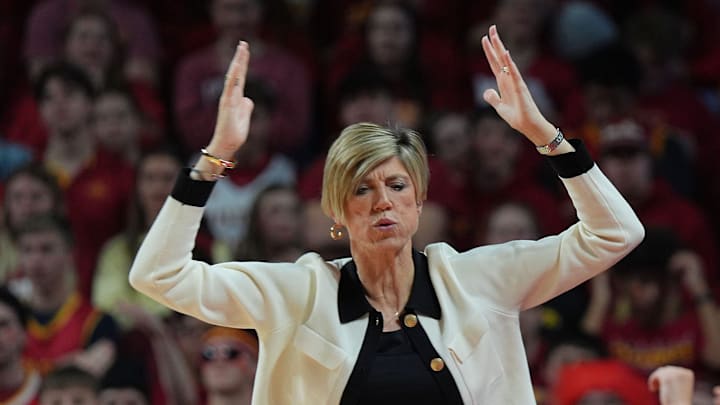 Iowa Hawkeyes women' basketball head coach Jan Jensen reacts from the bench during the third quarter against Iowa State in the NCAA women’s basketball Cy-Hawk Series on Dec. 10, 2025, at Hilton Coliseum in Ames, Iowa. Iowa Hawkeyes women' basketball head coach Jan Jensen reacts from the bench during the third quarter against Iowa State in the NCAA women’s basketball Cy-Hawk Series on Dec. 10, 2025, at Hilton Coliseum in Ames, Iowa.