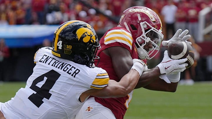Iowa State Cyclones' wide receiver Xavier Townsend (4) makes a catch a pass around Iowa Hawkeyes defensive back Koen Entringer (4) during the third quarter in the Cy-Hawk football at Jack Trice Stadium on Sept. 6, 2025, in Ames, Iowa Iowa State Cyclones' wide receiver Xavier Townsend (4) makes a catch a pass around Iowa Hawkeyes defensive back Koen Entringer (4) during the third quarter in the Cy-Hawk football at Jack Trice Stadium on Sept. 6, 2025, in Ames, Iowa