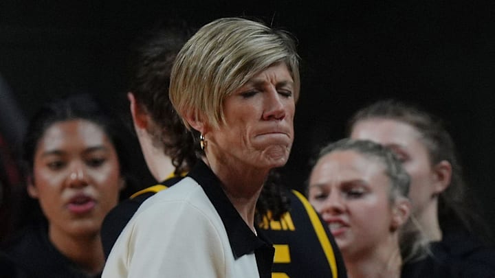Iowa Hawkeyes women' basketball head coach Jan Jensen watches during the first quarter against Iowa State in the NCAA women’s basketball Cy-Hawk Series on Dec. 10, 2025, at Hilton Coliseum in Ames, Iowa. Iowa Hawkeyes women' basketball head coach Jan Jensen watches during the first quarter against Iowa State in the NCAA women’s basketball Cy-Hawk Series on Dec. 10, 2025, at Hilton Coliseum in Ames, Iowa.