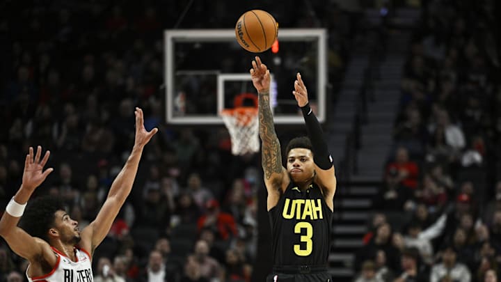 Oct 18, 2024; Portland, Oregon, USA; Utah Jazz guard Keyonte George (3) shoots a jump shot during the first half against Portland Trail Blazers forward Toumani Camara (33) at Moda Center. Mandatory Credit: Troy Wayrynen-Imagn Images