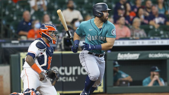 Seattle Mariners left fielder Jose Marmolejos (26) hits a two run RBI single against the Houston Astros  in the ninth inning at Minute Maid Park in 2021.