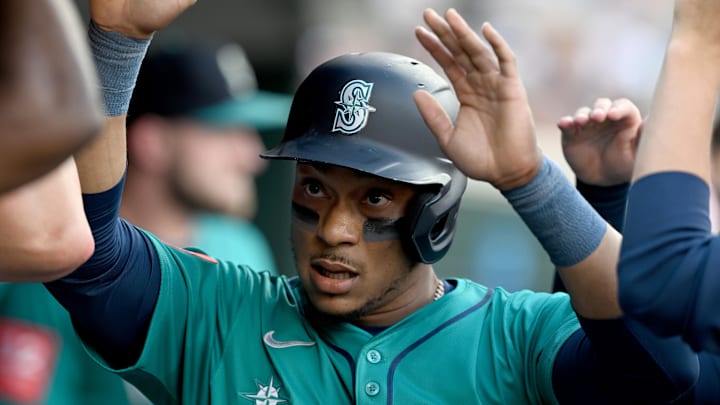 Seattle Mariners second baseman Jorge Polanco (7) celebrates in the dugout after scoring a run against the Detroit Tigers in the second inning at Comerica Park on July 11. 