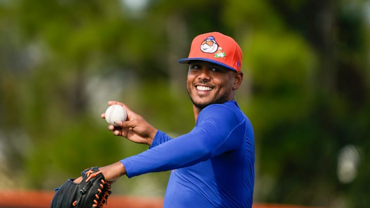 The New York Mets starting pitcher Freddy Peralta throws during spring training on the back fields of Clover Park on Feb. 11, 2026, in Port St. Lucie.