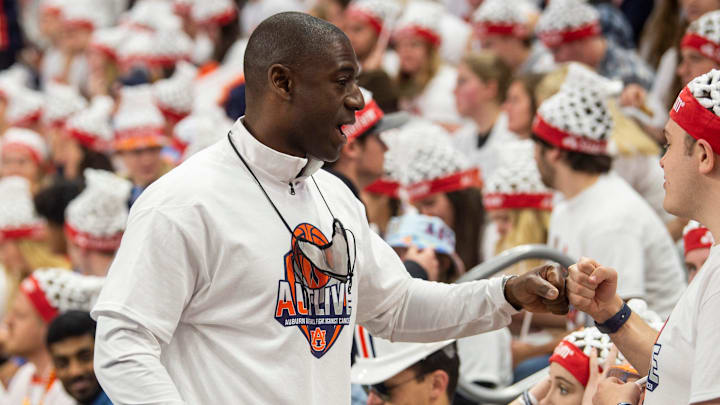 Auburn Athletic Director Allen Greene greets students before Auburn Tigers men's basketball takes on Texas A&M Aggies at Auburn Arena in Auburn, Ala., on Saturday, Feb. 12, 2022.