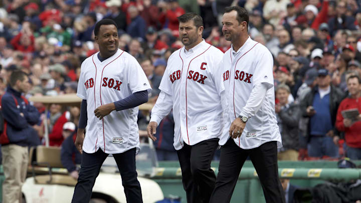 Apr 11, 2016; Boston, MA, USA; Boston Red Sox former players Pedro Mart  nez and Jason Varitek and Tim Wakefield take the field before the Red Sox home opener against the Baltimore Orioles at Fenway Park. Mandatory Credit: David Butler II-Imagn Images
