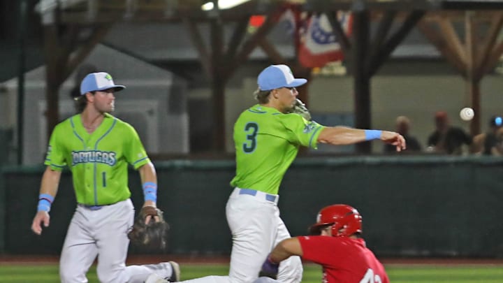 Daytona Tortugas shortstop Sammy Stafura (3) turns a double play as Palm Beach's Ian Petrutz (43) slides into second base on Tuesday, Sept. 10, 2024 at Jackie Robinson Ballpark.