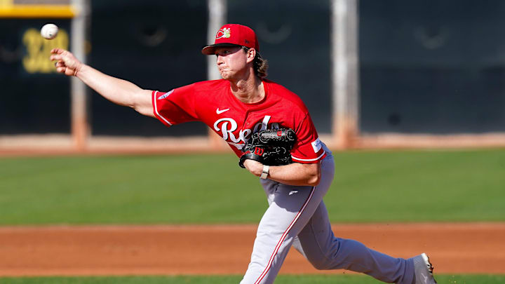 Cincinnati Reds pitcher Brady Singer (51) throws a pitch during a live batting practice, Sunday, Feb. 15, 2026, at the Cincinnati Reds player development complex in Goodyear, Ariz.