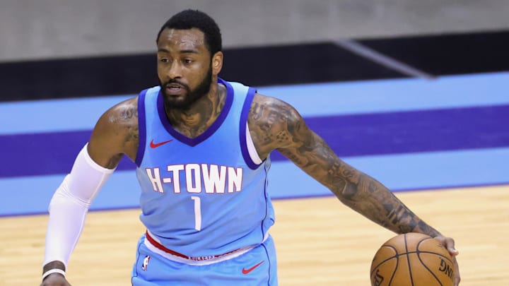 Apr 14, 2021; Houston, Texas, USA; John Wall #1 of the Houston Rockets controls the ball during the third quarter against the Indiana Pacers  at Toyota Center. Mandatory Credit:  Carmen Mandato/POOL PHOTOS-Imagn Images