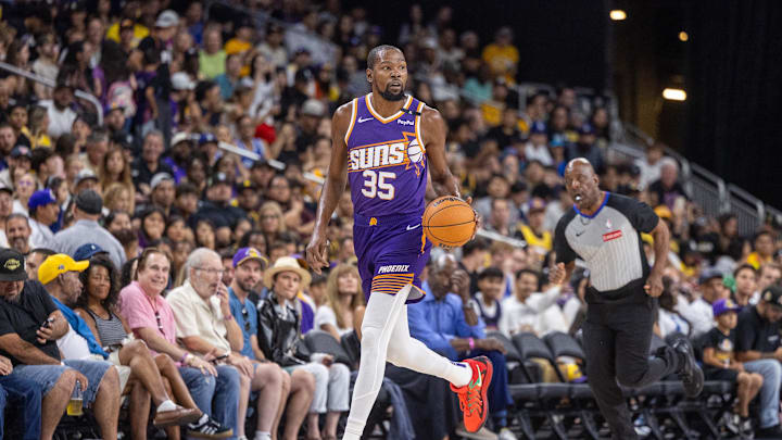 Oct 6, 2024; Palm Desert, California, USA; Phoenix Suns forward Kevin Durant (35) moves the ball against the Los Angeles Lakers during the first half at Acrisure Arena. Mandatory Credit: David Frerker-Imagn Images