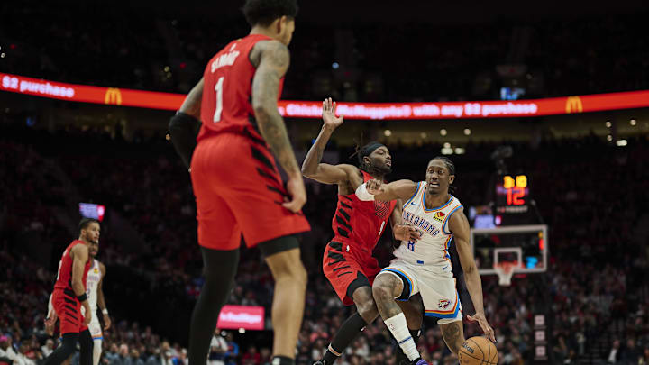 Jan 26, 2025; Portland, Oregon, USA; Oklahoma City Thunder forward Jalen Williams (8) drives to the basket during the second half against Portland Trail Blazers forward Jerami Grant (9) at Moda Center. Mandatory Credit: Troy Wayrynen-Imagn Images