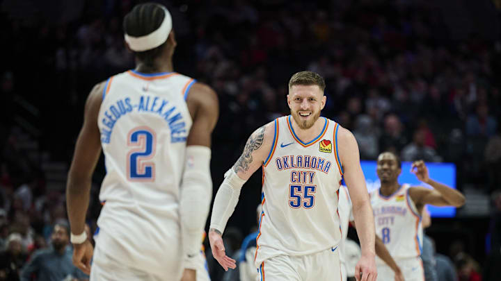 Jan 26, 2025; Portland, Oregon, USA; Oklahoma City Thunder center Isaiah Hartenstein (55) celebrates with guard Shai Gilgeous-Alexander (2) during a break in the second half against the Portland Trail Blazers at Moda Center. Mandatory Credit: Troy Wayrynen-Imagn Images Jan 26, 2025; Portland, Oregon, USA; Oklahoma City Thunder center Isaiah Hartenstein (55) celebrates with guard Shai Gilgeous-Alexander (2) during a break in the second half against the Portland Trail Blazers at Moda Center. Mandatory Credit: Troy Wayrynen-Imagn Images
