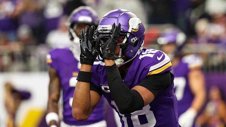 Dec 8, 2024; Minneapolis, Minnesota, USA; Minnesota Vikings wide receiver Justin Jefferson (18) celebrates his touchdown against the Atlanta Falcons during the second quarter at U.S. Bank Stadium. Mandatory Credit: Matt Krohn-Imagn Images