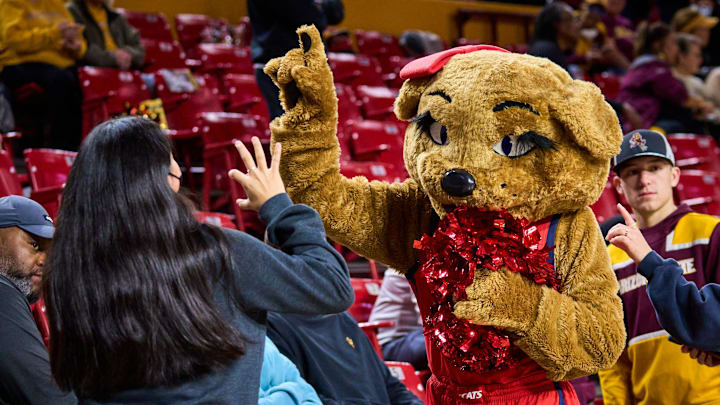 Jan 22, 2023; Tempe, AZ, USA; Wilma Wildcat interacts with fans before the Arizona Wildcats face the Arizona State Sun Devils at Desert Financial Arena on Sunday, Jan. 22, 2023. Mandatory Credit: Alex Gould/The Republic

Ncaa Womens Basketball Asu Womens Basketball Vs Arizona