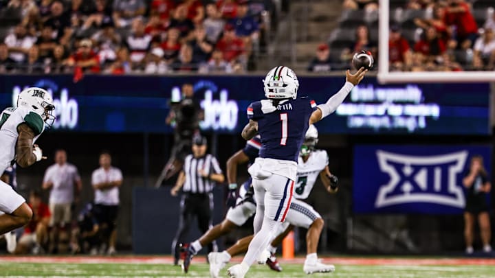 Aug 30, 2025; Tucson, Arizona, USA; Arizona Wildcats quarterback Noah Fifita (1) passes the ball during the first quarter of the game against the Hawaii Rainbow Warriors at Arizona Stadium. Mandatory Credit: Aryanna Frank-Imagn Images