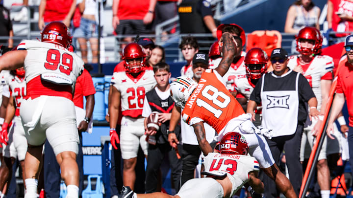 Oct 4, 2025; Tucson, Arizona, USA; Arizona Wildcats defensive back Dalton Johnson (43) tackles Oklahoma State Cowboys wide receiver Sam Jackson (18) during the third quarter of the game at Arizona Stadium. Mandatory Credit: Aryanna Frank-Imagn Imagesar