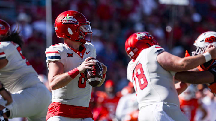 Oct 4, 2025; Tucson, Arizona, USA; Arizona Wildcats quarterback Braedyn Locke (8) looks to pass the ball during the fourth quarter of the game against the Oklahoma State Cowboys at Arizona Stadium. Mandatory Credit: Aryanna Frank-Imagn Images
