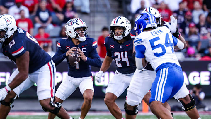 Oct 11, 2025; Tucson, Arizona, USA; Arizona Wildcats quarterback Noah Fifita (1) looks to pass the ball during the first quarter of the game against the Brigham Young Cougars at Arizona Stadium. Mandatory Credit: Aryanna Frank-Imagn Images