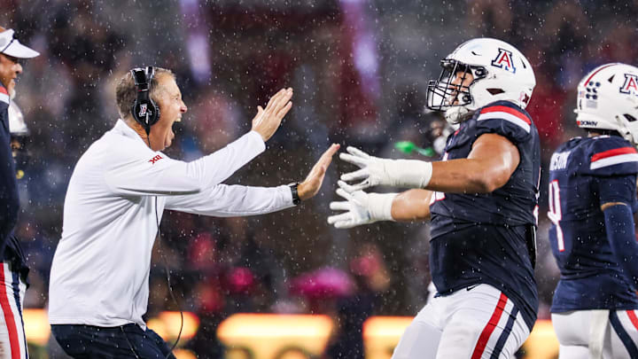 Oct 11, 2025; Tucson, Arizona, USA; Arizona Wildcats head coach Brent Brennan celebrates a blocked field goal during the second quarter of the game against the Brigham Young Cougars at Arizona Stadium. Mandatory Credit: Aryanna Frank-Imagn Images Oct 11, 2025; Tucson, Arizona, USA; Arizona Wildcats head coach Brent Brennan celebrates a blocked field goal during the second quarter of the game against the Brigham Young Cougars at Arizona Stadium. Mandatory Credit: Aryanna Frank-Imagn Images