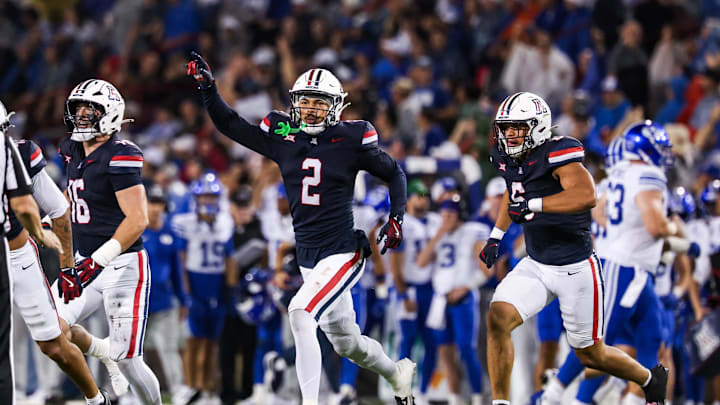Oct 11, 2025; Tucson, Arizona, USA; Arizona Wildcats defensive back Treydan Stokes (2) celebrates an interception he made during the second quarter against the Brigham Young Cougars at Arizona Stadium. Mandatory Credit: Aryanna Frank-Imagn Images