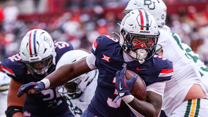 Nov 22, 2025; Tucson, Arizona, USA; Arizona Wildcats running back Kedrick Reescano (3) scores a touchdown during the third quarter of the game against the Baylor Bears at Casino Del Sol Stadium. Mandatory Credit: Aryanna Frank-Imagn Images
