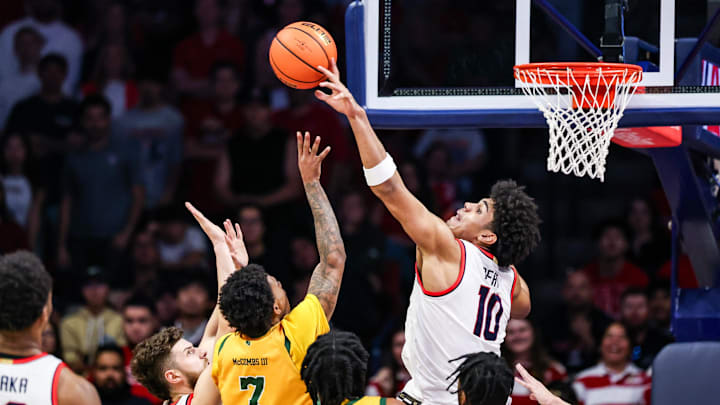 Nov 29, 2025; Tucson, Arizona, USA; Arizona Wildcats forward Koa Peat (10) blocks a shot by Norfolk State Spartans guard Anthony McComb III (7) during the second half at McKale Memorial Center. Mandatory Credit: Aryanna Frank-Imagn Images