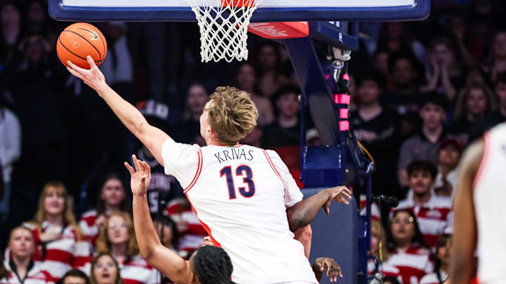 Jan 21, 2026; Tucson, Arizona, USA; Arizona Wildcats center Motiejus Krivas (13) attempted to tip the ball during the first half of the game against the Cincinnati Bearcats at McKale Memorial Center. Mandatory Credit: Aryanna Frank-Imagn Images