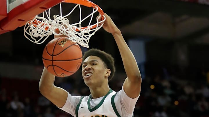 Freedom High School's Donovan Davis (24) against Elk Mound High School during their Division 3 semifinal game in the WIAA state boys basketball tournament on Thursday, March 20, 2025, at the Kohl Center in Madison, Wis. Freedom defeated Elk Mound 66-32.
