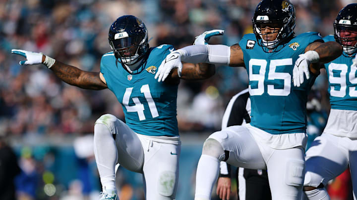 Jacksonville Jaguars linebacker Josh Allen (41) celebrates with teammates after setting the Jaguars single season record for sacks during second quarter action. The Jacksonville Jaguars hosted the Carolina Panthers at EverBank Stadium in Jacksonville, FL Sunday, December 31, 2023. The Jaguars went in at the half with a 9 to 0 lead. [Bob Self/Florida Times-Union]